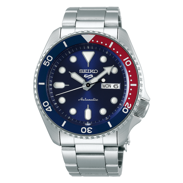 Orologio da polso marca seiko con quadrante blu e ghiera blue e rossa. Cinturino in acciaio inox